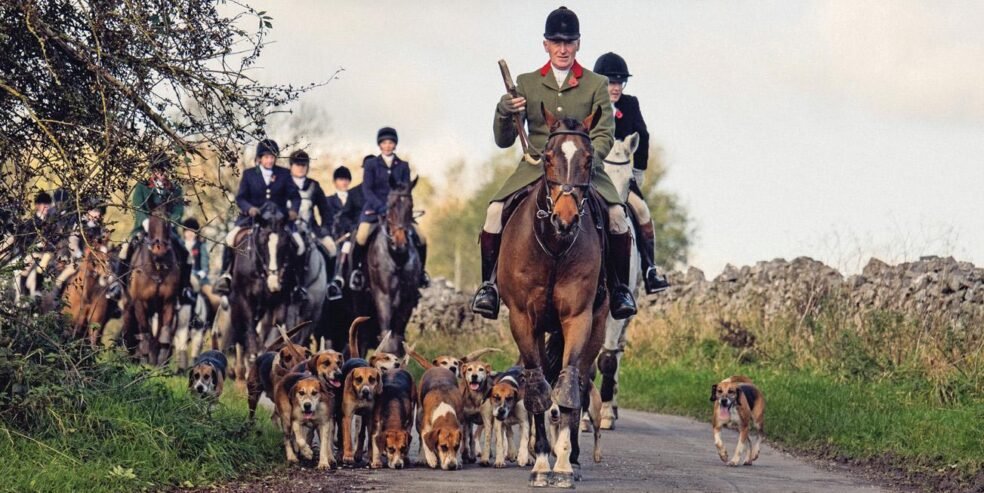 High Peak Harriers hounds and mounted field in the Derbyshire countryside